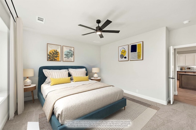 carpeted bedroom with ceiling fan