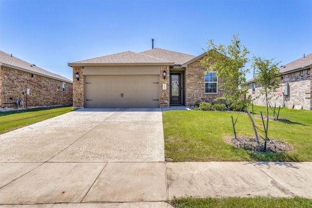 ranch-style house featuring a garage and a front yard