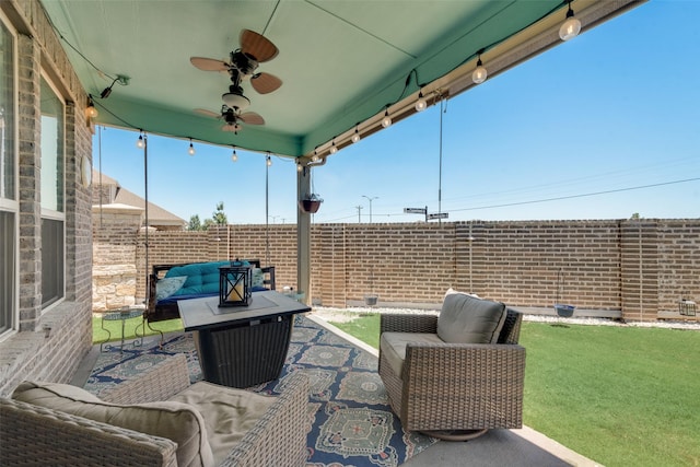 view of patio / terrace featuring an outdoor living space and ceiling fan