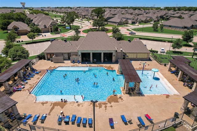 view of swimming pool featuring a patio area