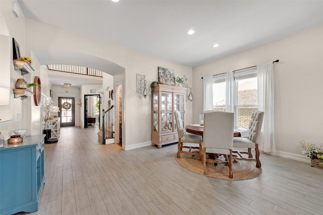 dining space with light wood-type flooring