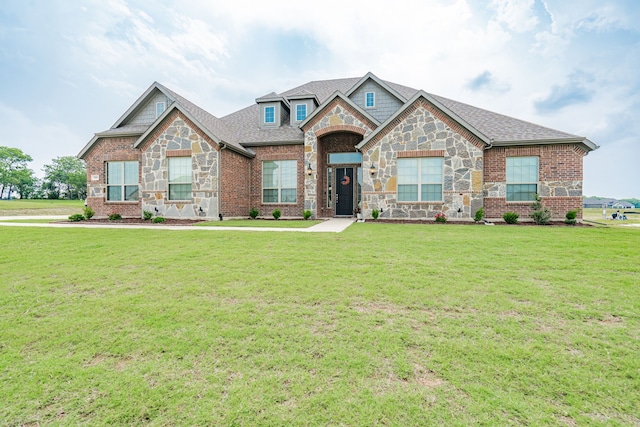 craftsman-style home with a front yard