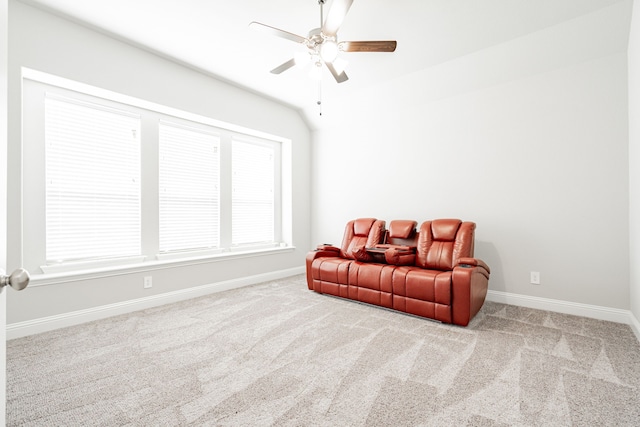 sitting room featuring ceiling fan and carpet floors