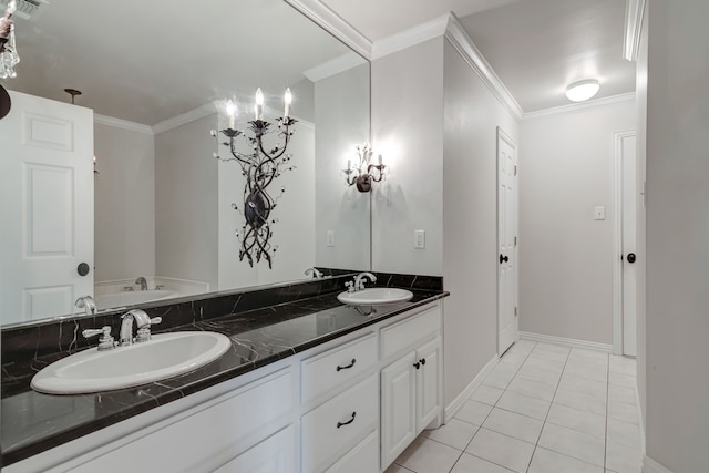 bathroom featuring vanity, tile patterned floors, and ornamental molding