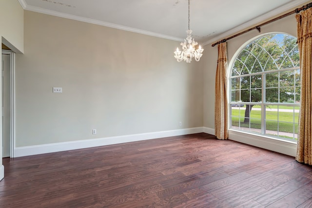 unfurnished dining area with plenty of natural light, hardwood / wood-style flooring, a chandelier, and ornamental molding