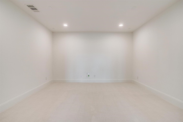 spare room with visible vents, recessed lighting, and baseboards