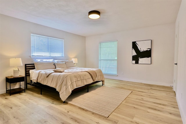 bedroom featuring light wood-type flooring