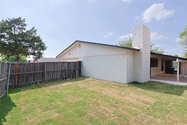 view of yard with a patio area