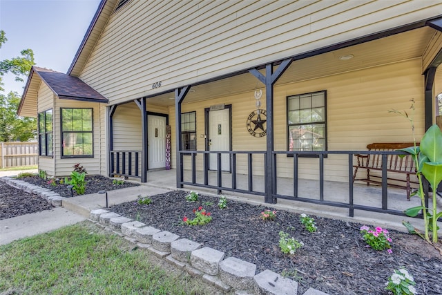 doorway to property featuring covered porch