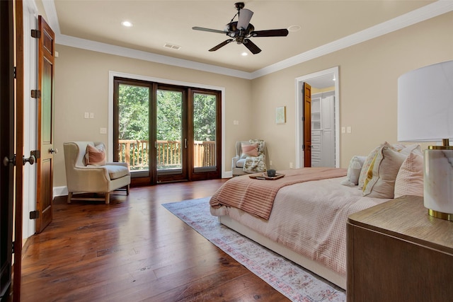 bedroom featuring visible vents, baseboards, access to outside, hardwood / wood-style floors, and crown molding