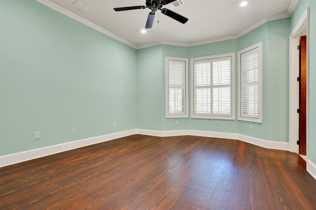 unfurnished room featuring dark wood-style floors, a ceiling fan, baseboards, and crown molding