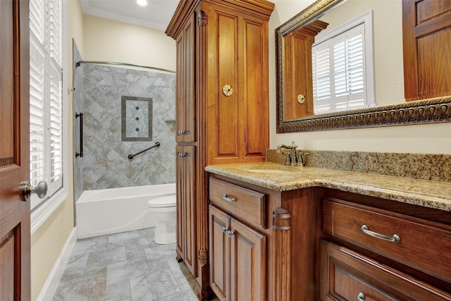 bathroom featuring toilet, tub / shower combination, crown molding, and vanity