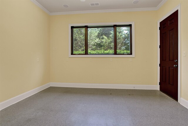 carpeted empty room with ornamental molding