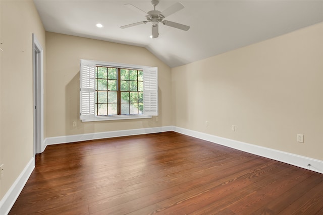 unfurnished room with dark wood-type flooring, ceiling fan, and vaulted ceiling