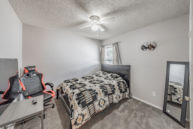 carpeted bedroom featuring a textured ceiling and ceiling fan