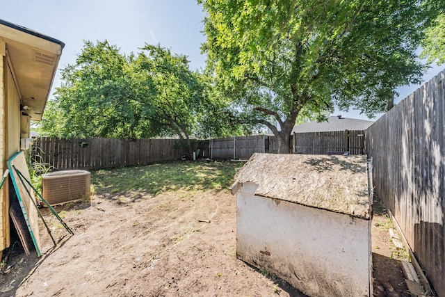 view of yard with central air condition unit