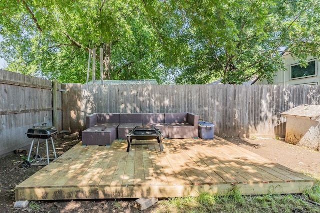 view of terrace with an outdoor hangout area and a deck