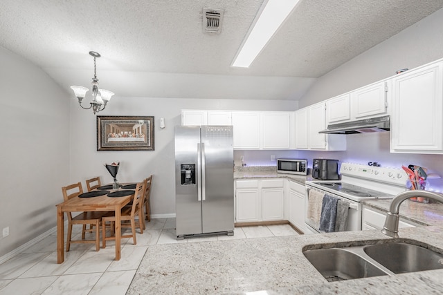 kitchen featuring white cabinetry, appliances with stainless steel finishes, a notable chandelier, sink, and light tile floors