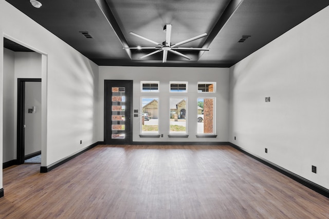 unfurnished room with hardwood / wood-style floors