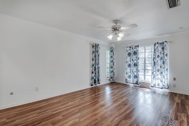 unfurnished room featuring hardwood / wood-style floors and ceiling fan