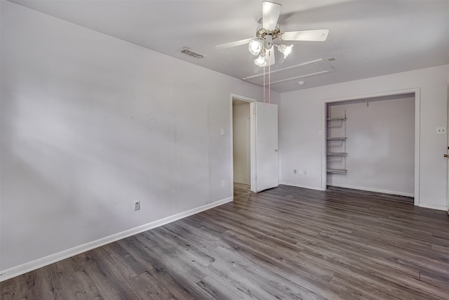 empty room featuring dark wood-type flooring