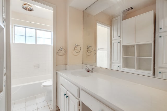 full bathroom featuring tile patterned floors, vanity, toilet, and shower / bathing tub combination