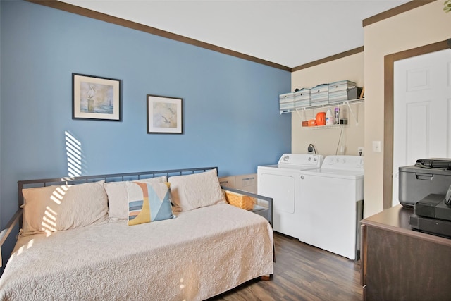 bedroom with washer and dryer, dark hardwood / wood-style floors, and ornamental molding