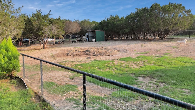 view of yard with a rural view