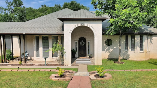 view of front of home with a front lawn