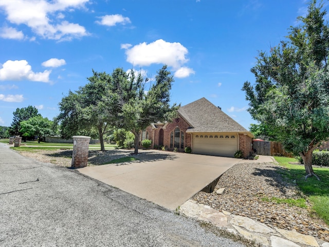 view of front of property with a garage