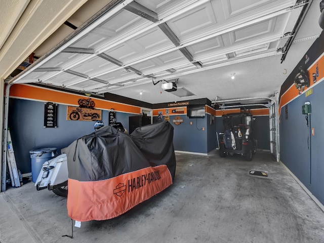 garage featuring a garage door opener