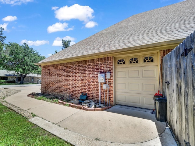 exterior space with a garage