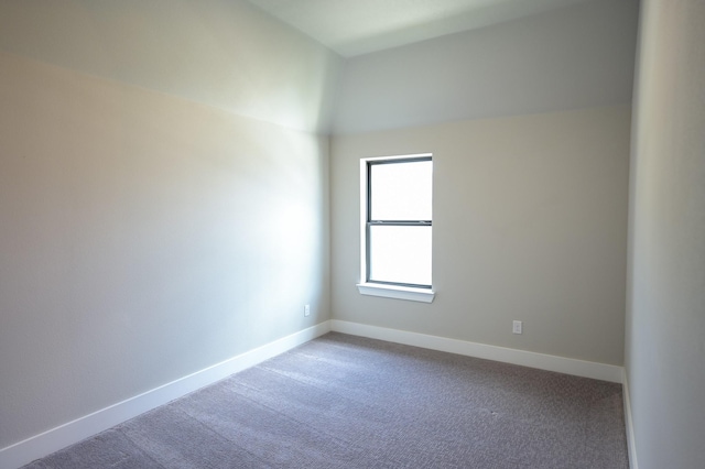 unfurnished room featuring carpet flooring