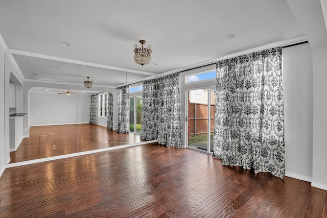 spare room with ceiling fan and wood-type flooring