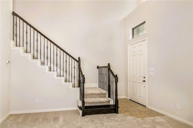 view of carpeted foyer