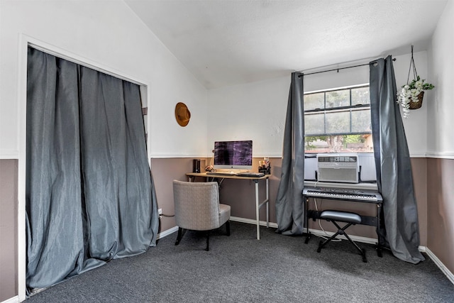 office featuring cooling unit, carpet floors, a textured ceiling, and vaulted ceiling