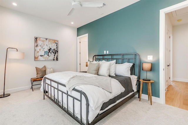 carpeted bedroom with ceiling fan