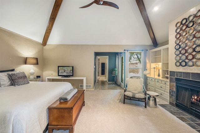 bedroom with carpet, high vaulted ceiling, ceiling fan, a fireplace, and beam ceiling