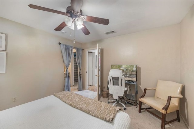 bedroom featuring ceiling fan and light colored carpet