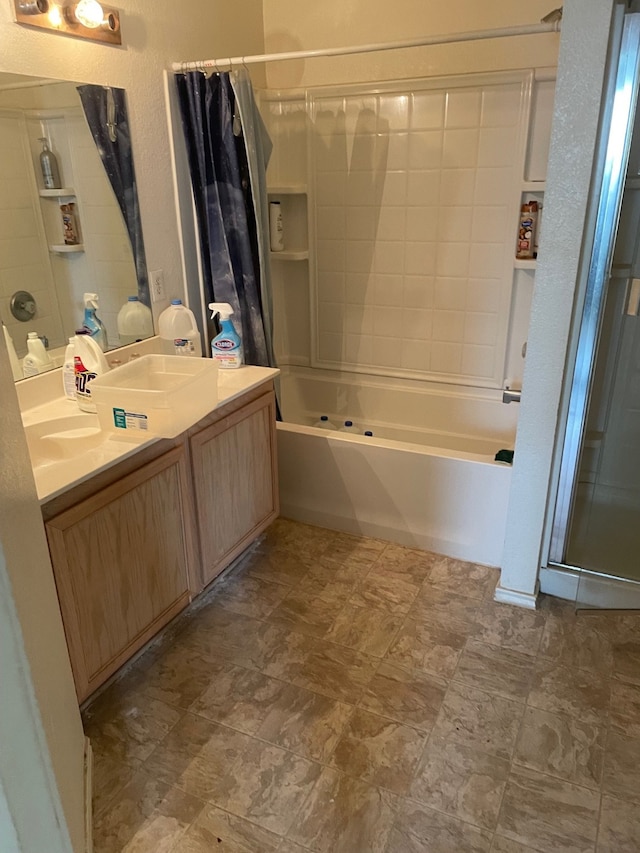 bathroom with shower / bath combination with curtain, tile patterned floors, and vanity