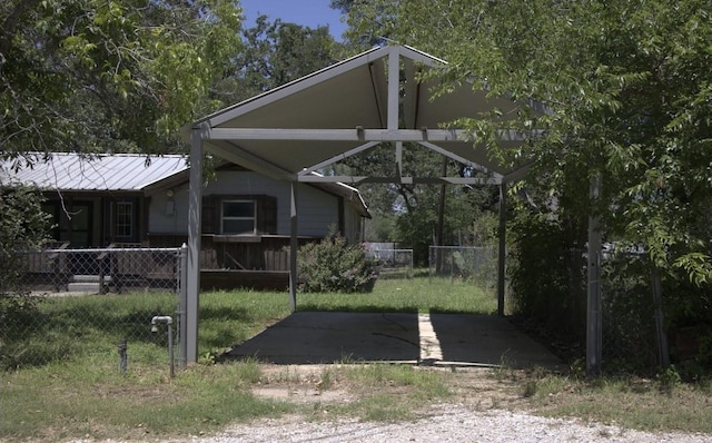 exterior space with a carport