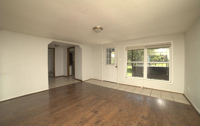 unfurnished room with light hardwood / wood-style flooring