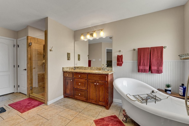 bathroom featuring tile patterned flooring, vanity, and independent shower and bath