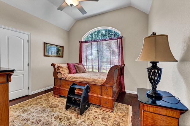 bedroom with dark hardwood / wood-style floors, ceiling fan, and lofted ceiling