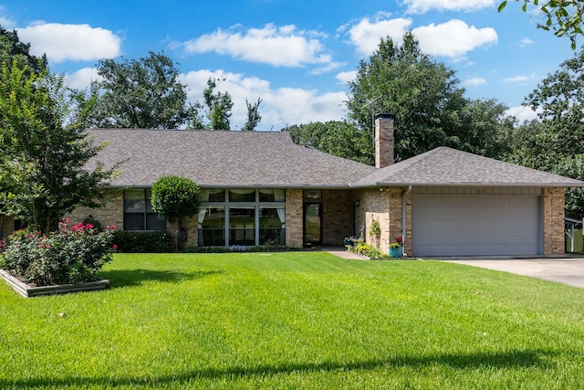 single story home with a front lawn and a garage