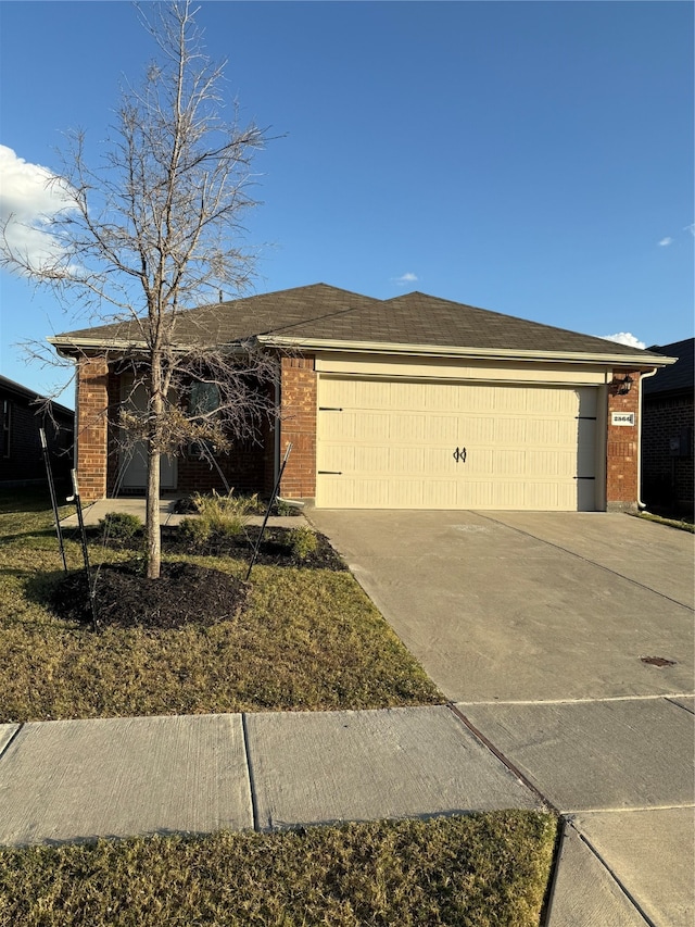 ranch-style house featuring a garage