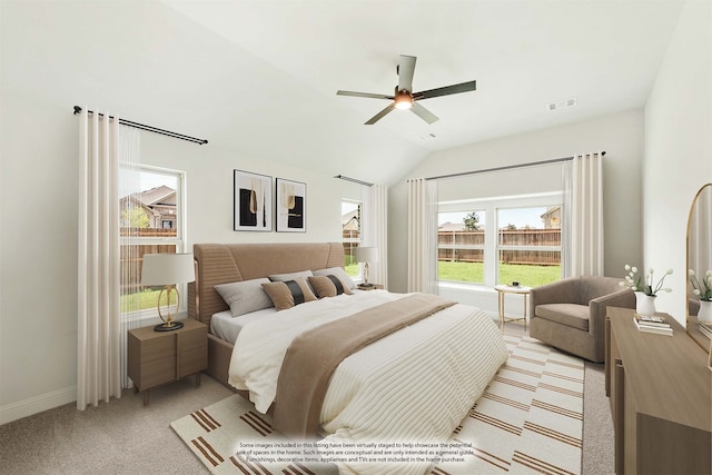 bedroom with light colored carpet, ceiling fan, and vaulted ceiling