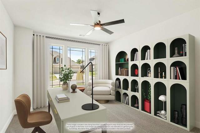 sitting room with carpet flooring and a ceiling fan