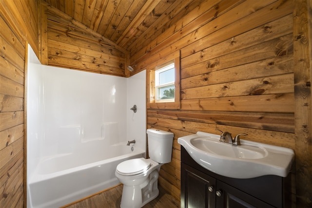 full bathroom featuring vanity, wooden ceiling, wooden walls, vaulted ceiling, and toilet