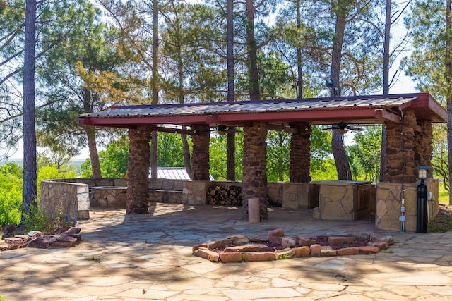 view of patio with a gazebo and ceiling fan